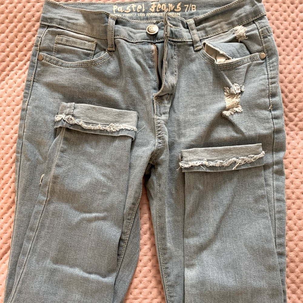 Jeans. Size 7/8. Ripped style. Basically new.